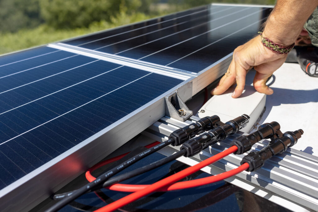 Solar Panels On The Roof Of A Camper Van